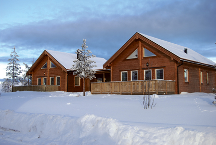 Stuga i vackert vinterlandskap i Blåbärsbyn i Orsa Grönklitt