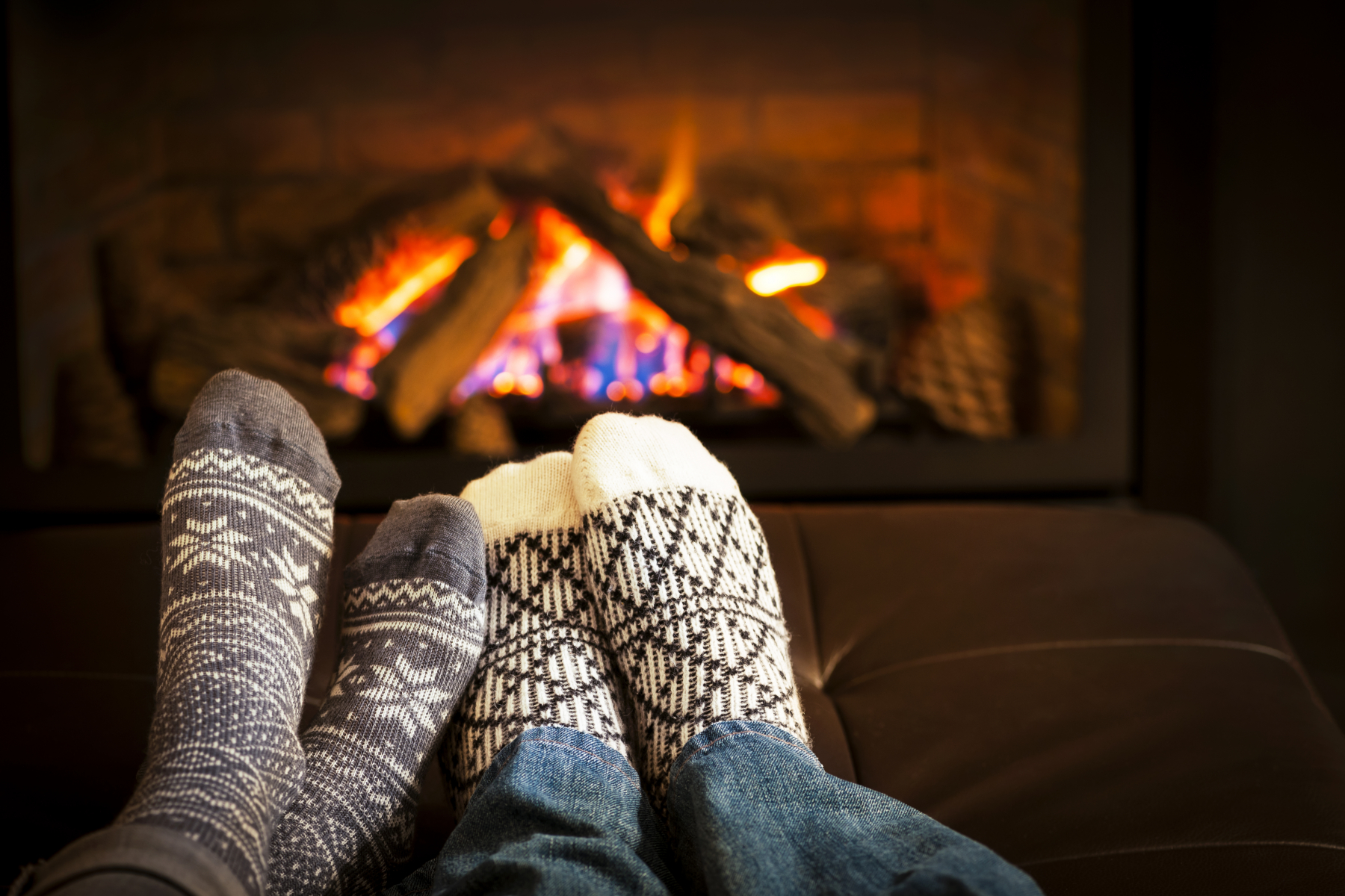 5020274 Feet Warming By Fireplace